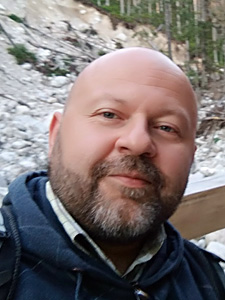 Portrait photo of Paweł Kapusta